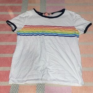 Medium rainbow t shirt with black outline on white background